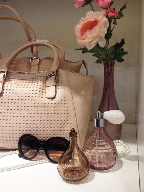 designer of purse and perfume